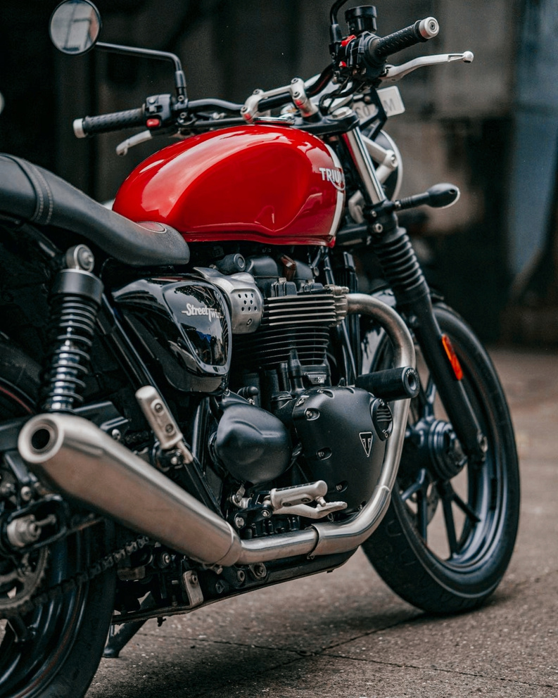 Photograph of a Black and Red Motorcycle